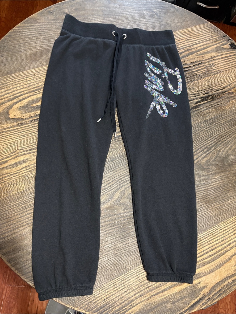 Black Sweatpants with Holographic Script